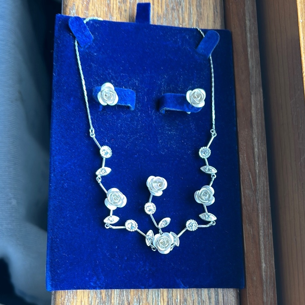 Silver Floral Necklace & earrings set with Asymmetrical Design